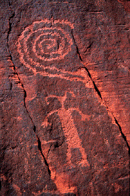 Spiral Petroglyph and man.jpg